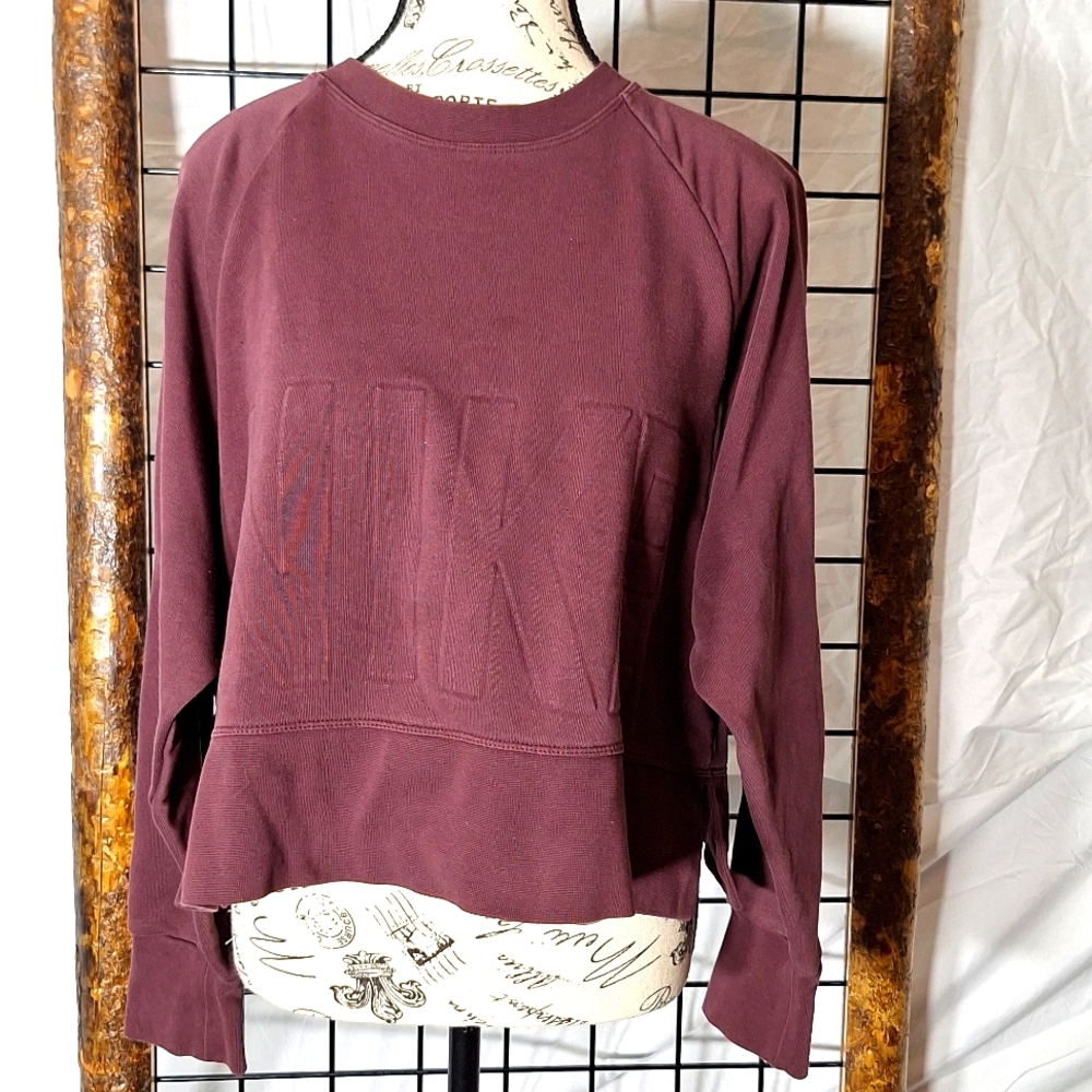 NIKE cropped sweatshirt size Medium.